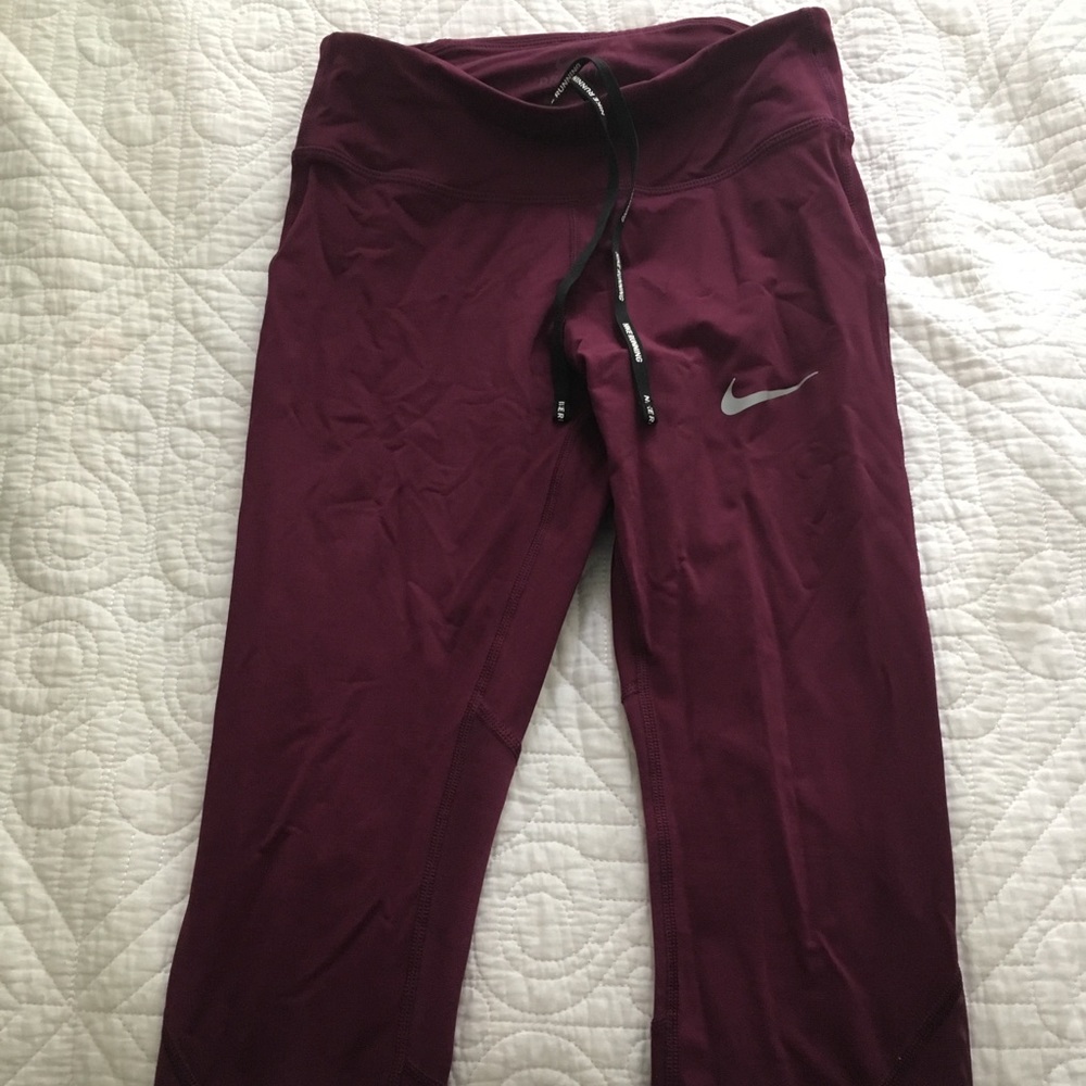 Maroon Nike running leggings